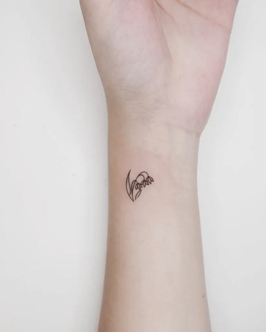 Tiny Fine Line Lily of the Valley Women Wrist Tattoo by @nieun_tat2