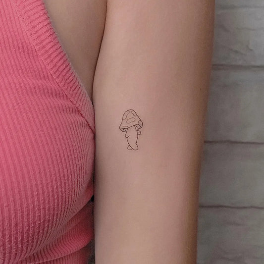 Tiny Fine Line Minimalist Mushroom on Women Arm Tattoo by @elvis_pachamamatattoo
