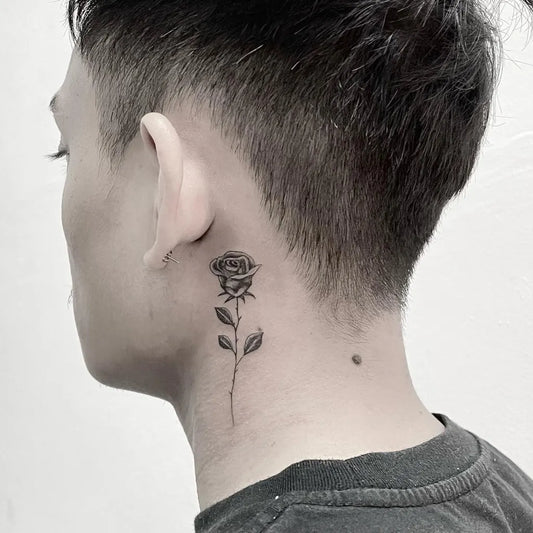 Tiny Fine Line Rose on Men Neck Tattoo by @kier.tattoo