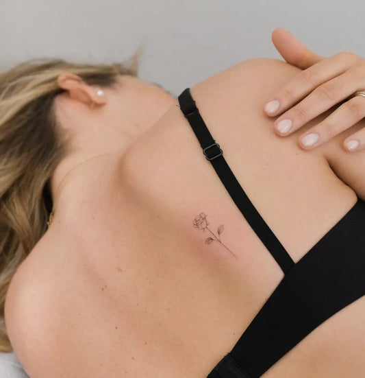 Tiny Fine Line Rose on Women Neck Tattoo by @stefano__mazza