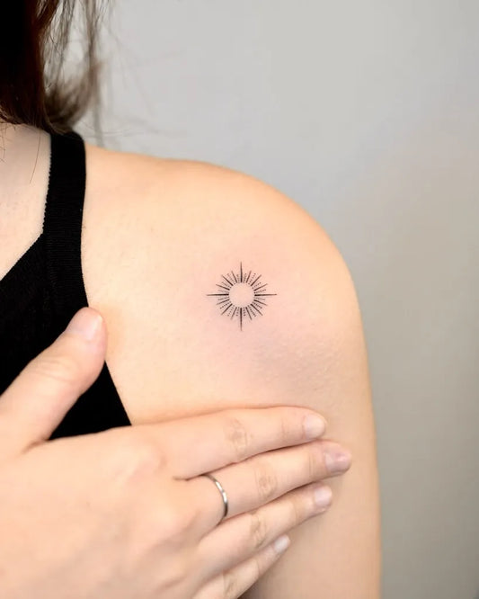 Tiny Fine Line Sun on Women Shoulder Tattoo by @tattooist_gaon