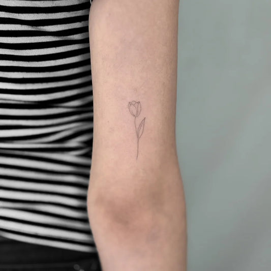 Tiny Fine Line Tulip Women Arm by @emily.fineline_ptc