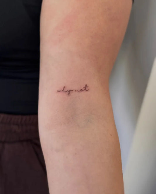 Tiny Fine Line Word Script on Women Upper Arm Tattoo by @kj.finelinetattoos