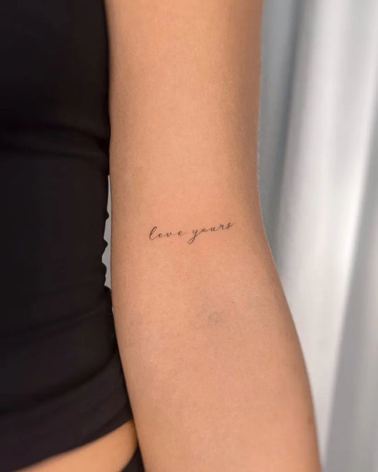 Tiny Fine Line love yours text on Women Arm Tattoo by @puertoink_amsterdam