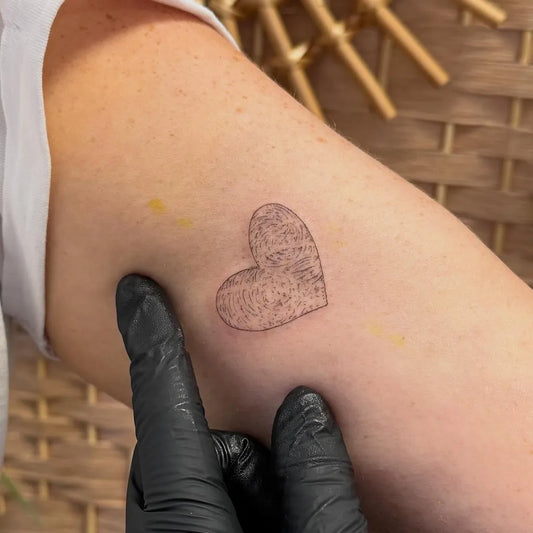 Tiny FineLine Heart on Women Arm Tattoo by @melissaannecraig