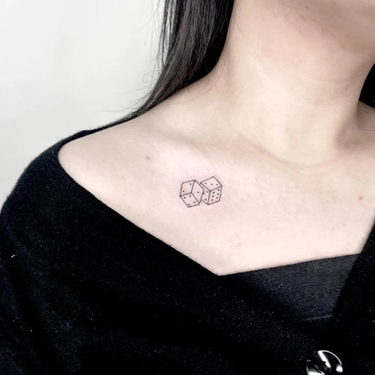 Tiny Linework Dice Tattoo on Women Shoulder by @tirta_arutalatattoo