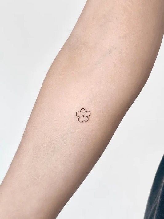 Tiny Linework Flower on Women Arm Tattoo by @cha.tattoo