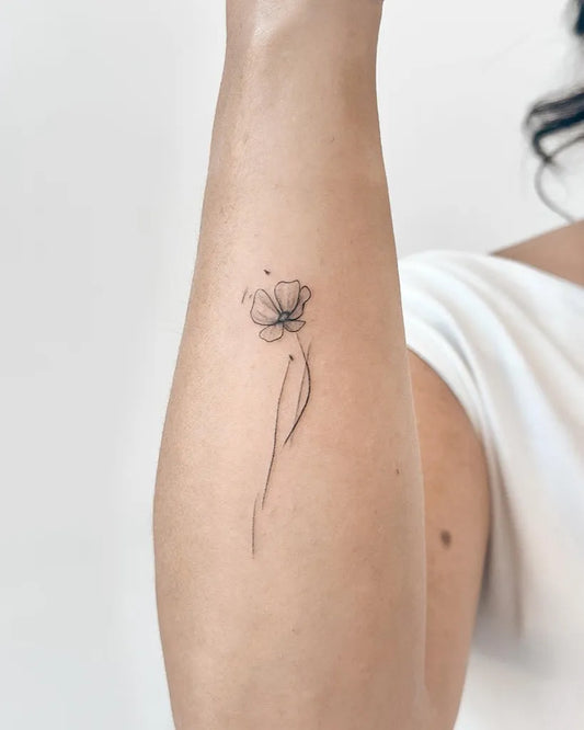 Tiny Linework Poppy on Women Arm Tattoo by @cha.tattoo
