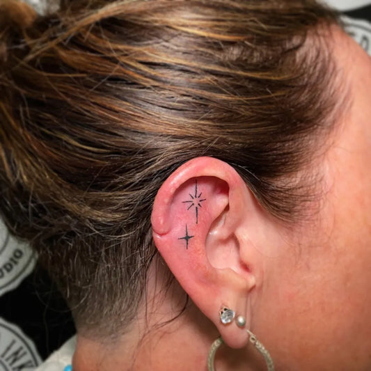 Tiny Linework Star Tattoo on Women Behind the Ear by @brandedink_