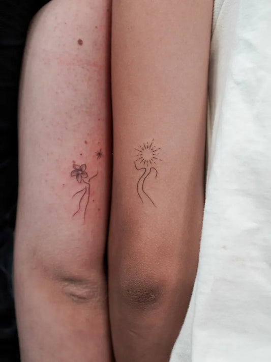 Tiny Linework Sun Flower Dancer on Couple Arms Matching Tattoo by @ivnn.om