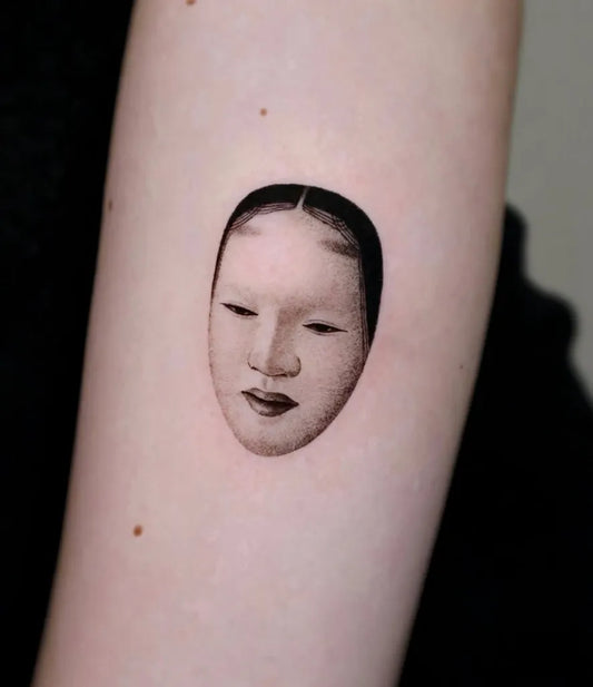 Tiny Micro Realism Noh Mask on Women Arm Tattoo by @tattooshop9lives