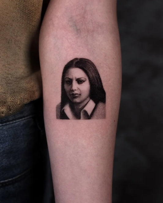 Tiny Micro Realism Woman Face Portrait on Women Arm Tattoo by @sugarangeltattoo
