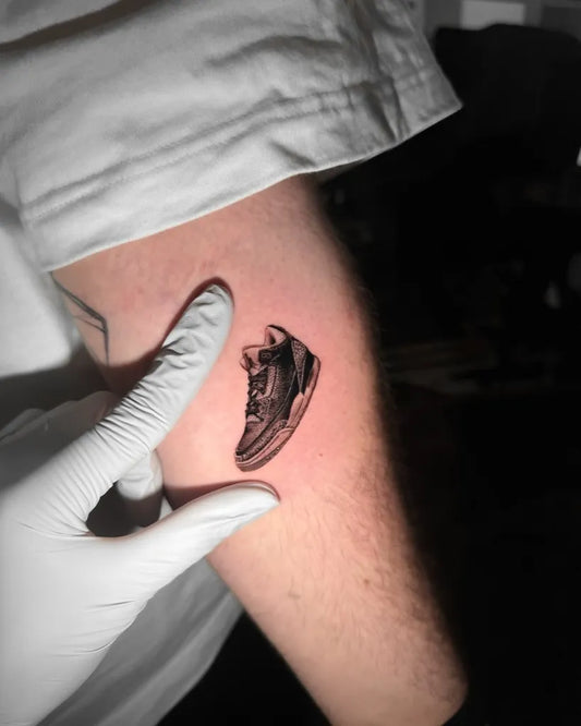 Tiny Micro Realism sneaker on Men forearm Tattoo by @4topher