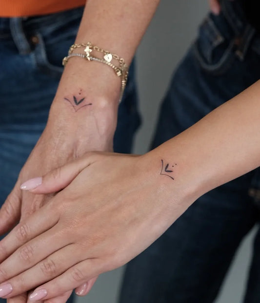 Tiny Minimalist Arrow Wrist on Women Tattoo by @melisagudentattoos