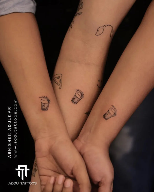 Tiny Minimalist Baby Feet on Friends Arms Matching Tattoo by @addu_tattooz_nagpur