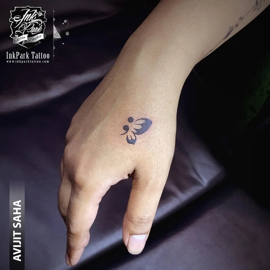 Tiny Minimalist Butterfly Semicolon on Women Hand Tattoo by @inkparktattoobd