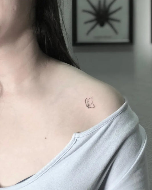 Tiny Minimalist Butterfly on Women Shoulder Tattoo by @hustonramos