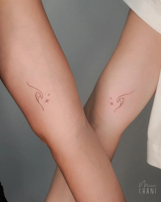 Tiny Minimalist Dolphin Eyes on Friends Arms Matching Tattoo by @mini.chani