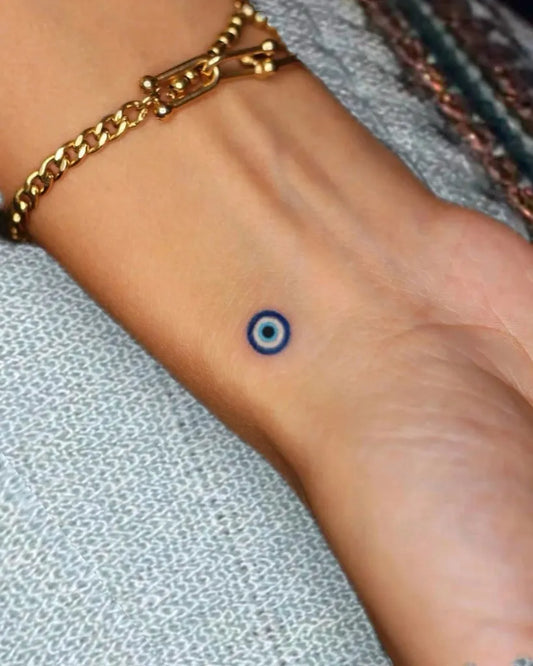 Tiny Minimalist Evil Eye on Women Wrist Tattoo by @freshalamode