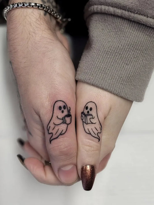 Tiny Minimalist Ghost Couple on Hands Matching Tattoo by @golonken.art.tattoo