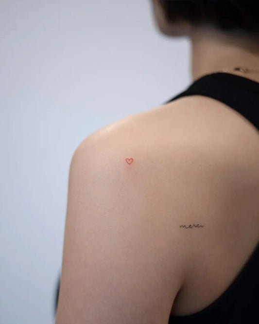 Tiny Minimalist Heart and Text on Women Shoulder Tattoo by @handitrip
