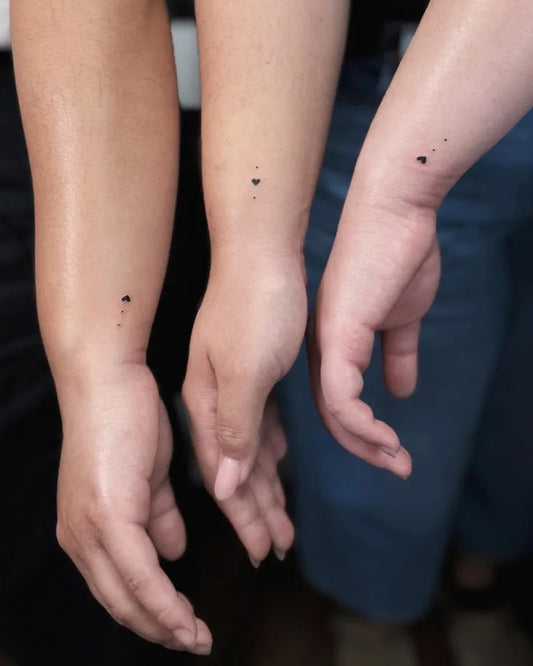 Tiny Minimalist Heart on Women Wrist Tattoo by @inked.jessica