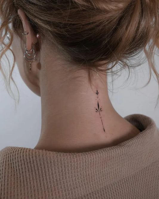 Tiny Minimalist Leaf on Women Nape Tattoo by @monochrom.ink