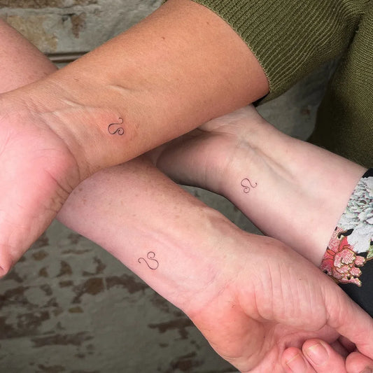 Tiny Minimalist Leo symbol on Friends Wrist Matching Tattoo by @laurnpokes
