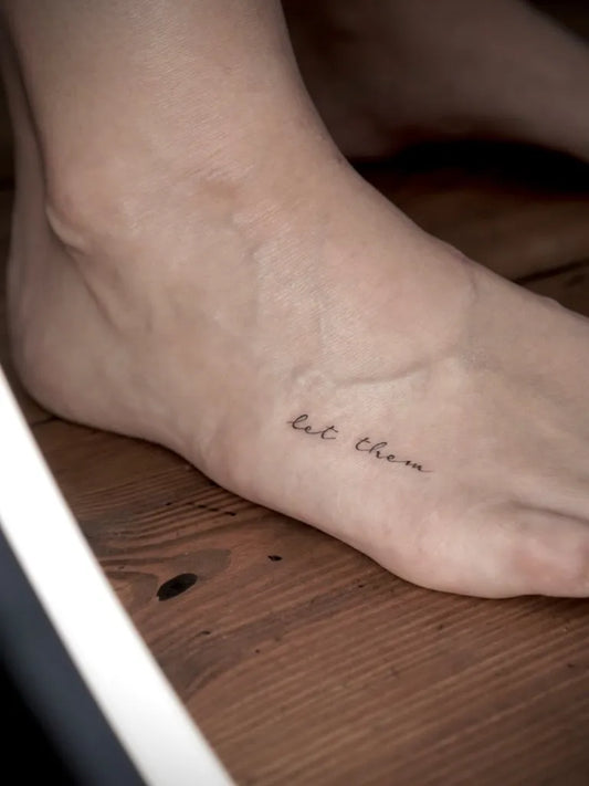Tiny Minimalist Let Them on Women Foot Tattoo by @linesbynata