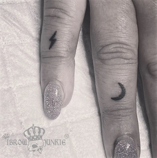 Tiny Minimalist Lightning Bolt Crescent Moon Tattoo on Women Finger by @ibrowjunkie