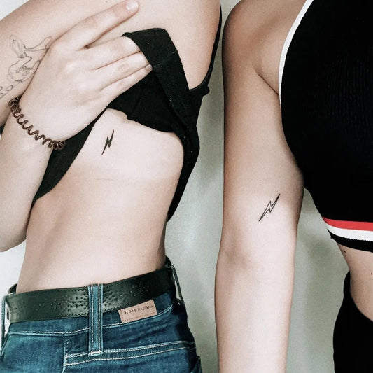Tiny Minimalist Lightning Bolt Tattoo on Women Arm by @lindseyxworth