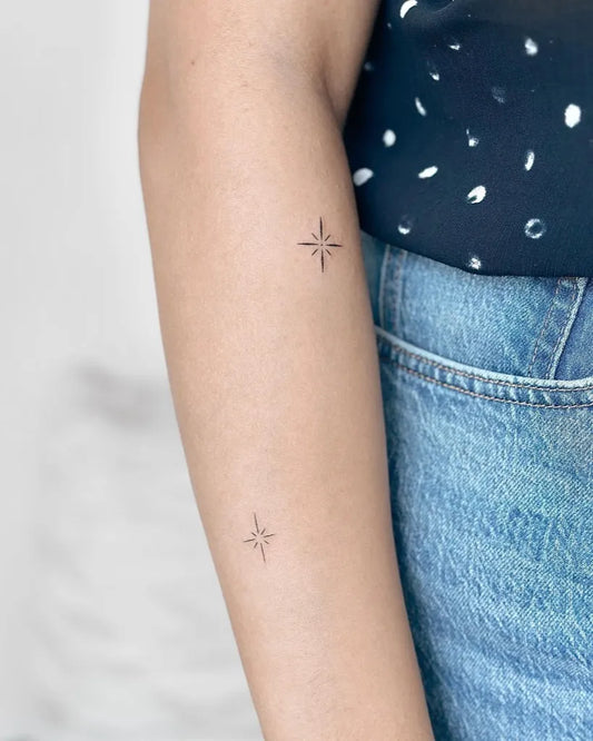 Tiny Minimalist North Stars on Women Arm Tattoo by @cha.tattoo