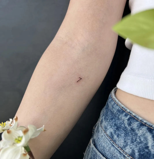 Tiny Minimalist Number 7 on Women Arm Tattoo by @kiristattoo