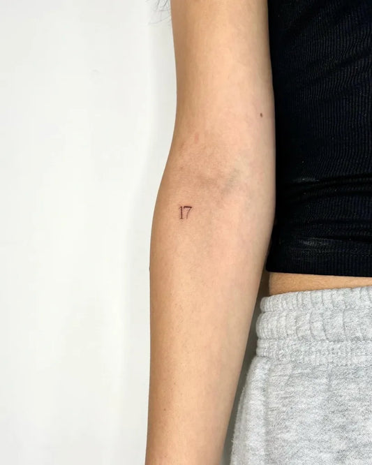Tiny Minimalist Number7 on Women Arm Tattoo by @tattsbyjen
