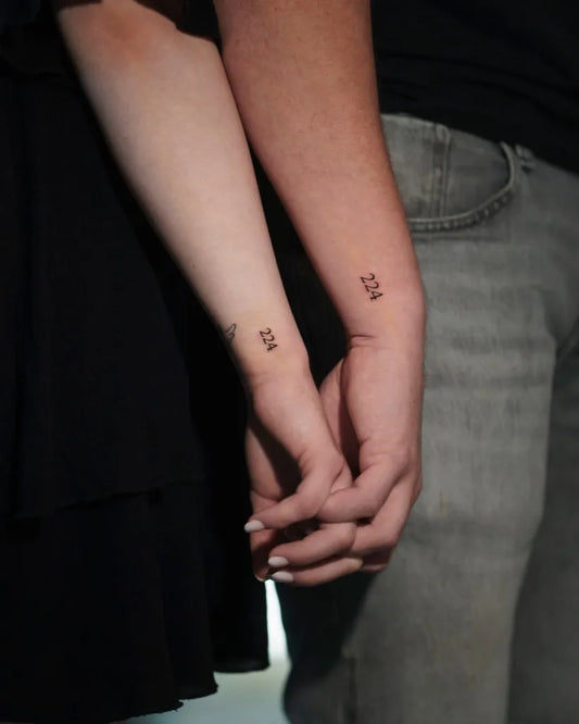 Tiny Minimalist Numbers on Couple Wrists Matching Tattoo by @nurburgink