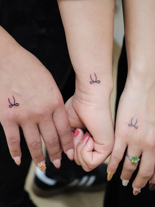 Tiny Minimalist Scorpio Symbol on Friends on Hands Matching Tattoo by @inkmyth_tattoo