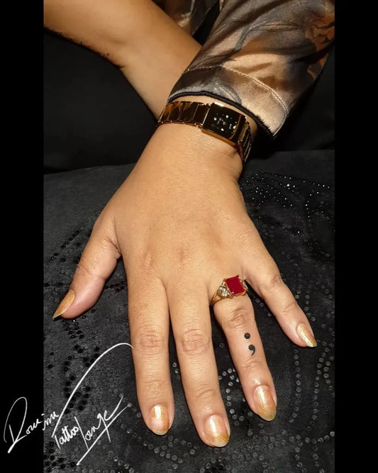 Tiny Minimalist Semicolon Dot on Women Hand Tattoo by @rockinktattoolounge