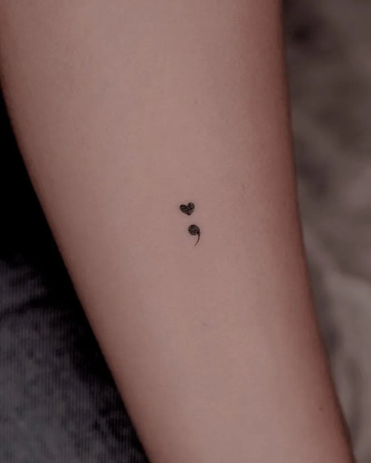 Tiny Minimalist Semicolon Heart on Women Arm Tattoo by @isoltattoo