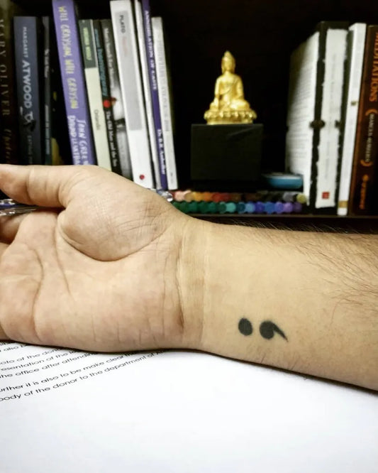 Tiny Minimalist Semicolon on Men Wrist Tattoo by @anweshpokkuluri