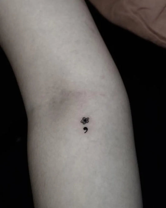 Tiny Minimalist Semicolon on Women Elbow Tattoo by @scrttattooshop