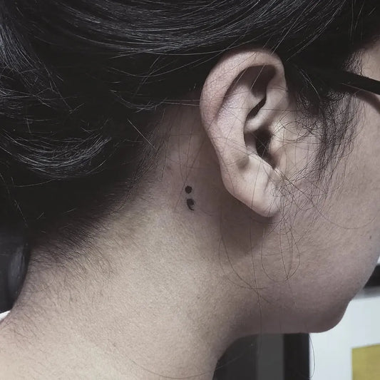 Tiny Minimalist Semicolon on Women Neck Tattoo by @klass.tattoos