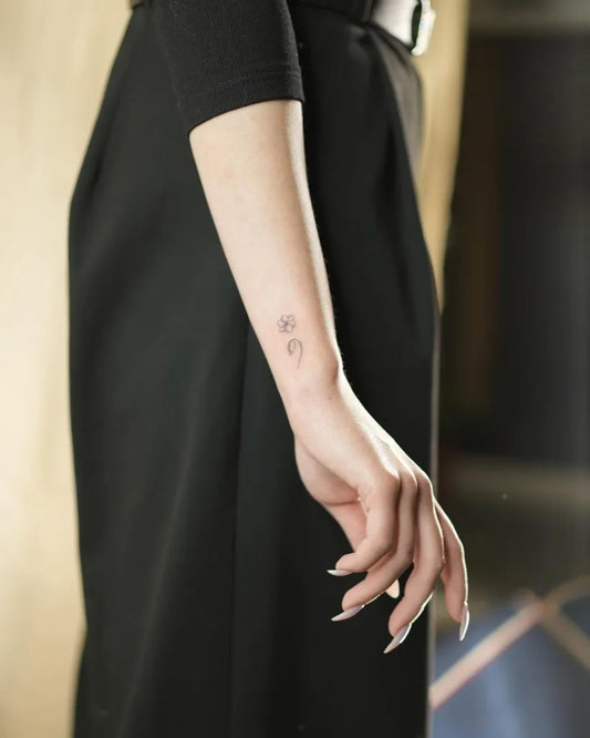 Tiny Minimalist Semicolon on Women Wrist Tattoo by @henna_lisovska
