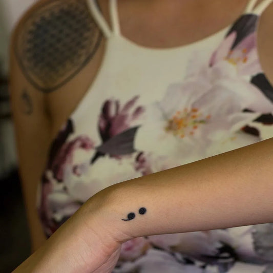 Tiny Minimalist Semicolon on Women Wrist Tattoo by @latinskulls