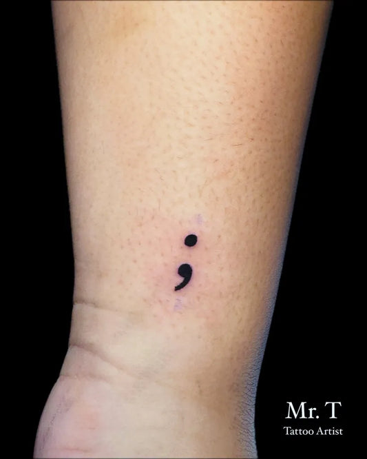 Tiny Minimalist Semicolon on Women Wrist Tattoo by @mr.t_tattooartist