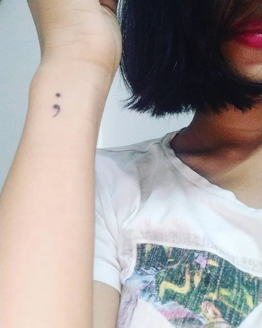 Tiny Minimalist Semicolon on Women Wrist Tattoo by @sanjalikiran