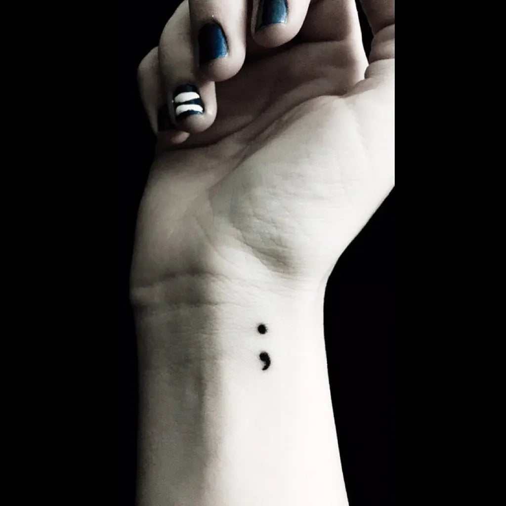 Tiny Minimalist Semicolon on Women Wrist Tattoo by @sarasvarda