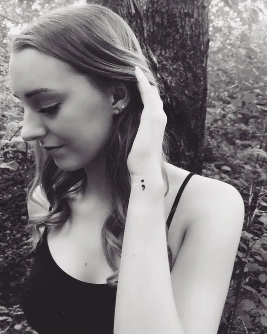 Tiny Minimalist Semicolon on Women Wrist Tattoo by @suziecooke