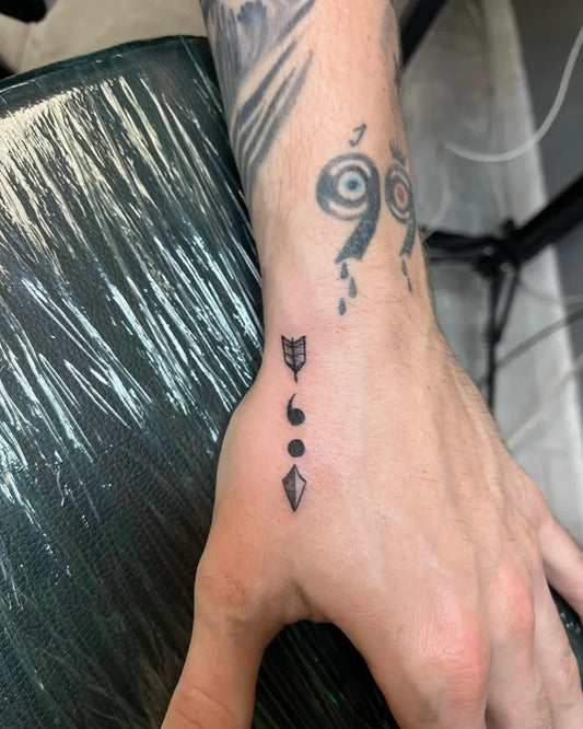 Tiny Minimalist SemicolonArrowDiamond on Men Wrist Tattoo by @getmarkedart