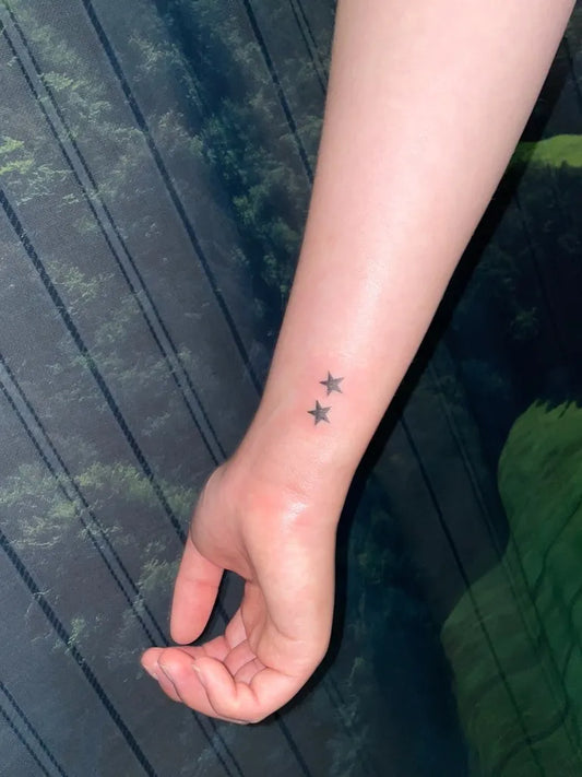 Tiny Minimalist Star Tattoo on Women Wrist by @crackttt