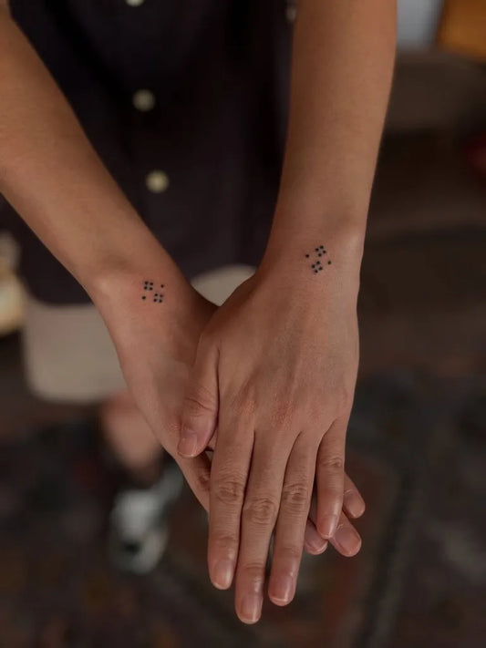 Tiny Minimalist Star on Couple Wrist Matching Tattoo by @md.poke